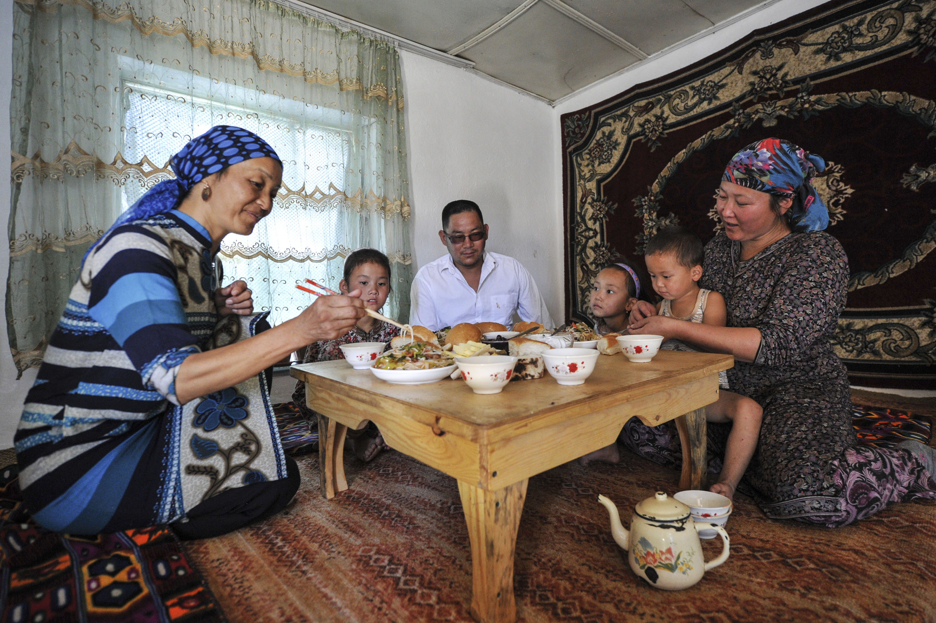 Family eating together image